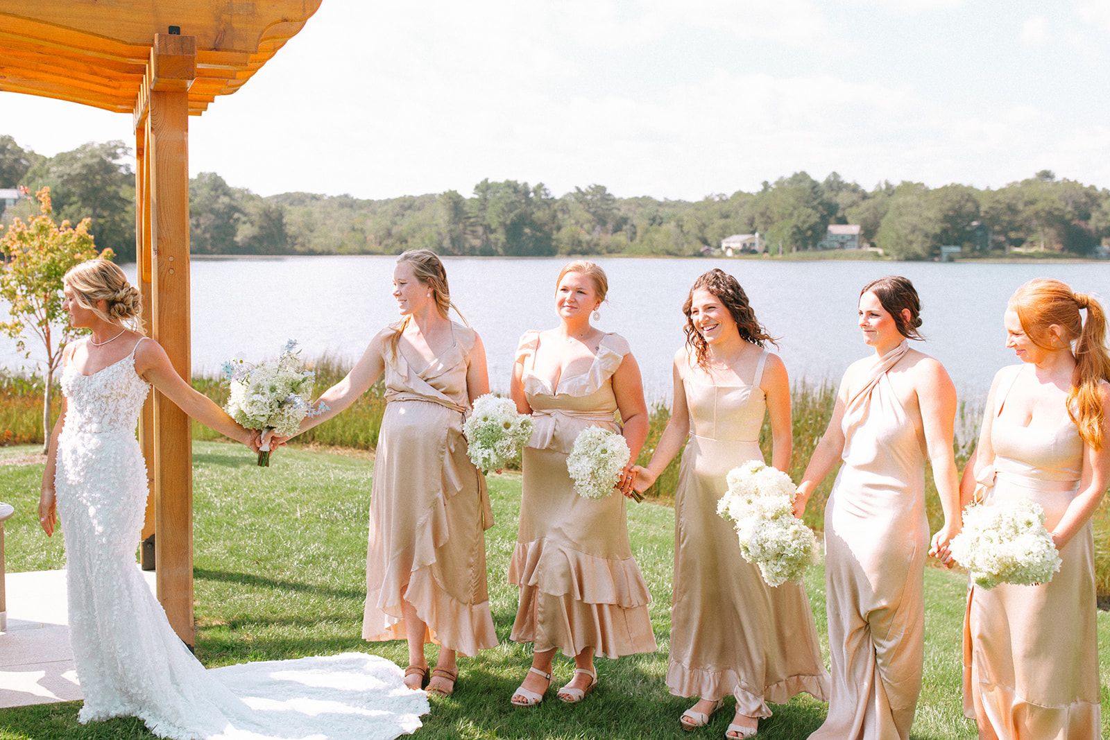 Bridesmaids during wedding ceremony.